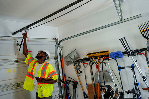 Professional Garage Door Panel Replacement technician working in Plattsburgh West, NY
